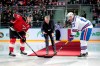 Former Manchester United coach Jose Mourinho, center, makes the first puck drop at Monday's Kontinental Hockey League game between Avangard Omsk and SKA St. Petersburg in Moscow, Russia, Monday, Feb. 4, 2019. Former Manchester United coach has ceremonially opened an ice hockey game in Russia _ and promptly fallen on the ice. (AP Photo/Dmitry Golubovich)