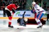 Former Manchester United coach Jose Mourinho, center, falls down after making the first puck drop at Monday's Kontinental Hockey League game between Avangard Omsk and SKA St. Petersburg in Moscow, Russia, Monday, Feb. 4, 2019. Former Manchester United coach has ceremonially opened an ice hockey game in Russia _ and promptly fallen on the ice. Two-time Stanley Cup winner Pavel Datsyuk of SKA St. Petersburg is on the right, Yevgeni Medvedev of Avangard Omsk is on the left. (AP Photo/Dmitry Golubovich)