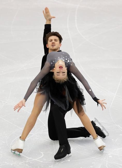 Alexandra Stepanova and Ivan Bukin of Russia perform in the ice dance rhythm dance at the ISU European figure skating championships in Minsk, Belarus, Friday, Jan. 25, 2019. (AP Photo/Sergei Grits)