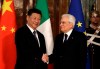 Chinese President Xi Jinping, left, shakes hands with Italian President Sergio Mattarella at the Quirinale Presidential Palace, in Rome, Friday, March 22, 2019. Jinping is launching a two-day official visit aimed at deepening economic and cultural ties with Italy through an ambitious infrastructure building program called 