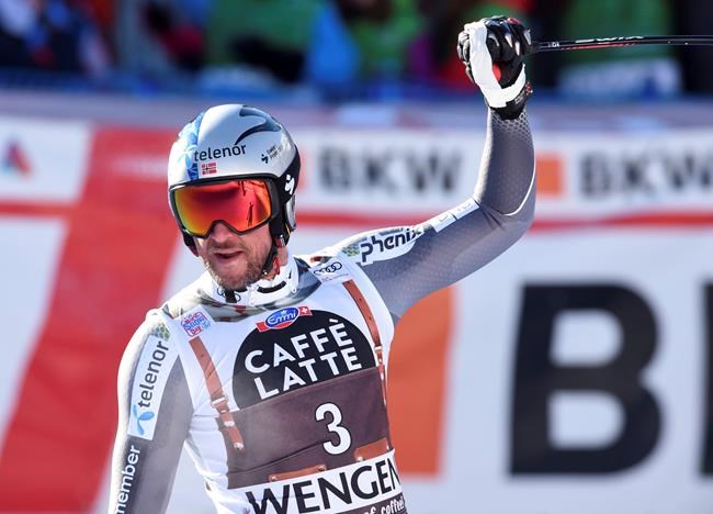 Norway's Aksel Lund Svindal celebrates at the finish area an alpine ski, men's World Cup downhill in Wengen, Switzerland, Saturday, Jan. 19, 2019. (AP Photo/Marco Tacca)