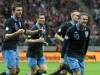 England's Wayne Rooney ,right, celebrates his goal against Poland during their World Cup Group H qualifying soccer match at National Stadium in Warsaw, Poland, Wednesday, Oct. 17, 2012 (AP Photo/Czarek Sokolowski