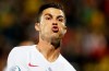 Portugal's Cristiano Ronaldo celebrates after scoring his side's opening goal from a penalty shot during the Euro 2020 group B qualifying soccer match between Lithuania and Portugal at LFF stadium in Vilnius, Lithuania, Tuesday, Sept. 10, 2019. (AP Photo/Mindaugas Kulbis)