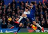 Chelsea's Marcos Alonso is challenged by Tottenham's Son Heung-Min, rear, during the English Premier League soccer match between Chelsea and Tottenham Hotspur at Stamford Bridge stadium in London, Wednesday, Feb. 27, 2019. (AP Photo/Frank Augstein)