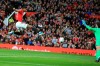 Manchester United's Marcus Rashford scores his side's opening goal during the English Premier League soccer match between Manchester United and Liverpool at the Old Trafford stadium in Manchester, England, Sunday, Oct. 20, 2019. (AP Photo/Jon Super)