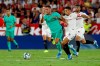 Real Madrid's Eden Hazard, center, is challenged by Sevilla's Daniel Carrico during the Spanish La Liga soccer match between Sevilla and Real Madrid at the Ramon Sanchez Pizjuan stadium in Seville, Spain, Sunday, Sept. 22, 2019. (AP Photo/Miguel Morenatti)