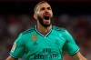 Real Madrid's Karim Benzema celebrates after scoring his side's opening goal during the Spanish La Liga soccer match between Sevilla and Real Madrid at the Ramon Sanchez Pizjuan stadium in Seville, Spain, Sunday, Sept. 22, 2019. (AP Photo/Miguel Morenatti)