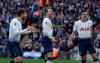 Tottenham Hotspur's Christian Eriksen, center, celebrates with Tottenham Hotspur's Harry Winks, right, after scoring his side's second goal during the English Premier League soccer match between Tottenham Hotspur and Leicester City at Wembley stadium in London, Sunday, Feb. 10, 2019. (AP Photo/Matt Dunham)