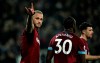 West Ham's Marko Arnautovic celebrates his assist during the English Premier League soccer match between West Ham and Fulham at the London Stadium in London, Friday, Feb. 22, 2019. (AP Photo/Matt Dunham)