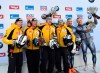 Germany's Francesco Friedrich, center right and Thorsten Margis, right celebrate their victory with runners up Johannes Lochner, second left and Florian Bauer, left, also from Germany and third placed Latvia's Oskars Kibermanis, second right and Matiss Miknis right, after the two-man Bobsled World Cup race in Igls, near Innsbruck, Austria, Saturday, Jan. 19, 2019. (AP Photo/Kerstin Joensson)