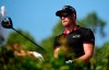 Sweden's Henrik Stenson watches after hitting from the fourth tee during the last round of the Hero World Challenge at Albany Golf Club in Nassau, Bahamas, Sunday, Dec. 2, 2018. (AP Photo/Dante Carrer)