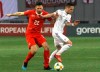 Switzerland's Fabian Schar, left, and Georgia's Jano Ananidze challenge for the ball during the Euro 2020 group D qualifying soccer match between Georgia and Switzerland at Boris Paichadze Erovnuli stadium in Tbilisi, Georgia, Saturday, March 23, 2019. (AP Photo/Shakh Aivazov)