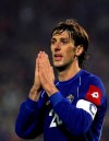 In this Wednesday, Oct. 12, 2005 file photo, Mladen Krstajic of Serbia-Montenegro reacts during their World Cup qualifying soccer match for the Germany 2006 World Championships against Bosnia-Herzegovina in Belgrade. Serbia's soccer association has fired national team coach Mladen Krstajic after a humiliating loss against Ukraine in a European Championship qualifier. Krstajic, a former national team defender and Bundesliga veteran, was named the national team coach ahead of the World Cup in Russia last year despite having never held a previous coaching position. (AP Photo/Darko Vojinovic, File)