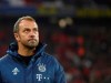 Bayern's interim coach Hansi Flick looks on during warm up before the German Bundesliga soccer match between FC Bayern Munich and Borussia Dortmund, in Munich, Germany, Saturday, Nov. 9, 2019. (AP Photo/Matthias Schrader)