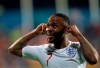 England's Raheem Sterling celebrates scoring his side's fifth goal during the Euro 2020 group A qualifying soccer match between Montenegro and England at the City Stadium in Podgorica, Montenegro, Monday, March 25, 2019. (AP Photo/Darko Vojinovic)