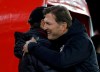 Southampton's manager Ralph Hasenhuttl, right, hugs the Liverpool's manager Juergen Klopp before the English Premier League soccer match between Southampton and Liverpool at St Mary's stadium in Southampton, England Friday, April 5, 2019. (AP Photo/Kirsty Wigglesworth)
