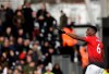 Manchester United's Paul Pogba celebrates after scoring his side's opening goal during the English Premier League soccer match between Fulham and Manchester United at Craven Cottage stadium in London, Saturday, Feb. 9, 2019. (AP Photo/Matt Dunham)