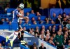Chelsea's Fikayo Tomori, left, jumps for the ball with Valencia's Rodrigo Moreno during the Champions League Group H soccer match between Chelsea and Valencia at Stamford Bridge stadium in London, Tuesday, Sept. 17, 2019. (AP Photo/Frank Augstein)