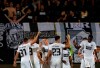 Partizan's Ognjen Ozegovic, third left, celebrates with teammates after scoring his side's second goal during the Europa League second qualifying round, second leg soccer match between Partizan and Connah's Quay Nomads at the Partizan stadium in Belgrade, Serbia, Thursday, Aug. 1, 2019. (AP Photo/Darko Vojinovic)