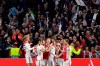 Ajax's Matthijs de Ligt celebrates with teammates after scoring his side's opening goal during the Champions League semifinal second leg soccer match between Ajax and Tottenham Hotspur at the Johan Cruyff ArenA in Amsterdam, Netherlands, Wednesday, May 8, 2019. (AP Photo/Martin Meissner)