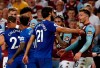 Aston Villa's Jack Grealish, right, discusses with Everton's Andre Gomes, center, during the English Premier League soccer match between Aston Villa and Everton at Villa Park in Birmingham, England, Friday, Aug. 23, 2019. (AP Photo/Rui Vieira)