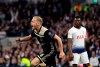 Ajax's Donny van de Beek celebrates after scoring his side's opening goal during the Champions League semifinal first leg soccer match between Tottenham Hotspur and Ajax at the Tottenham Hotspur stadium in London, Tuesday, April 30, 2019. (AP Photo/Kirsty Wigglesworth)