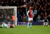 Aston Villa players react at the end of the English Premier League soccer match between Aston Villa and West Ham United at Villa Park in Birmingham, England, Monday, Sept. 16, 2019. (AP Photo/Rui Vieira)