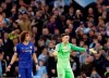Chelsea goalkeeper Kepa Arrizabalaga, right, and Chelsea's David Luiz react during the English League Cup final soccer match between Chelsea and Manchester City at Wembley stadium in London, England, Sunday, Feb. 24, 2019. (AP Photo/Tim Ireland)