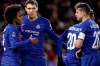 Chelsea's Willian, left, celebrates with teammates after scoring his side's third goal during the English FA Cup fourth round soccer match between Chelsea and Sheffield Wednesday at Stamford Bridge stadium in London, Sunday, Jan. 27, 2019. (AP Photo/Kirsty Wigglesworth)