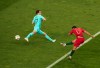 Portugal's Goncalo Guedes, right, scores his side's opening goal during the UEFA Nations League final soccer match between Portugal and Netherlands at the Dragao stadium in Porto, Portugal, Sunday, June 9, 2019. (AP Photo/Luis Vieira)