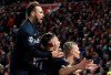 Salzburg's Erling Braut Haland, right, celebrates with teammates after scoring his side's third goal during the Champions League group E soccer match between Liverpool and Red Bull Salzburg at Anfield stadium in Liverpool, England, Wednesday, Oct. 2, 2019. (AP Photo/Jon Super)