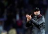 Liverpool manager Juergen Klopp, left, applauds to supporters at the end of the Champions League quarterfinals, 2nd leg, soccer match between FC Porto and Liverpool at the Dragao stadium in Porto, Portugal, Wednesday, April 17, 2019. (AP Photo/Luis Vieira)