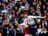 Arsenal's Laurent Koscielny, left, jumps for the ball with Tottenham's Fernando Llorente during the English Premier League soccer match between Tottenham Hotspur and Arsenal at Wembley stadium in London, Saturday, March 2, 2019. (AP Photo/Tim Ireland)
