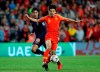 China's defender Wu Lei, right, duels for the ball with Thailand's defender Chalermpong Kerdka during the AFC Asian Cup round of 16 soccer match between Thailand and China at the Hazza Bin Zayed stadium in Al Ain, United Arab Emirates, Sunday, Jan. 20, 2019. (AP Photo/Hassan Ammar)