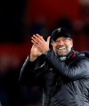Liverpool's manager Juergen Klopp celebrates at the end of the English Premier League soccer match between Southampton and Liverpool at St Mary's stadium in Southampton, England Friday, April 5, 2019. (AP Photo/Kirsty Wigglesworth)
