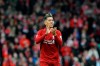 Liverpool's Roberto Firmino applauds to supporters at the end of the English Premier League soccer match between Liverpool and Chelsea at Anfield stadium in Liverpool, England, Sunday, April 14, 2019. (AP Photo/Rui Vieira)