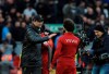 Liverpool manager Juergen Klopp, left, celebrates with Liverpool's Mohamed Salah at the end of the English Premier League soccer match between Liverpool and Tottenham Hotspur at Anfield stadium in Liverpool, England, Sunday, March 31, 2019. (AP Photo/Rui Vieira)