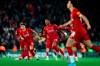 Liverpool players celebrate at the end of the English League Cup soccer match between Liverpool and Arsenal at Anfield stadium in Liverpool, England, Wednesday, Oct. 30, 2019. (AP Photo/Jon Super)