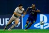 Shakhtar's Taison, left, and Dinamo Zagreb's Kevin Theophile-Catherine challenge for the ball during the group C Champions League soccer match between Dinamo Zagreb and Shakhtar Donetsk at Maksimir Stadium in Zagreb, Croatia, Wednesday, Nov. 6, 2019. (AP Photo/Darko Bandic)
