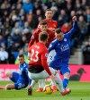 Leicester's James Maddison, right, and Manchester United's Luke Shaw challenge for the ball during the English Premier League soccer match between Leicester City and Manchester United at the King Power Stadium in Leicester, England, Sunday, Feb 3, 2019. (AP Photo/Rui Vieira)