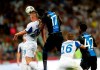 Brugge's Simon Deli, center, and Dynamo Kiev's Mykyta Burda head the balll during the Champions League third qualifying round, second leg, soccer match between Dynamo Kyiv and Club Brugge at the Olympiyskiy stadium in Kiev, Ukraine, Tuesday, Aug. 13, 2019. (AP Photo/Efrem Lukatsky)