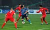 Japan's Water Endo, center, controls the ball during the World Cup 2022 Qualifying Asian zone Group F soccer match between Kyrgyzstan and Japan in Bishkek, Kyrgyzstan, Thursday, Nov. 14, 2019. (AP Photo/Vladimir Voronin)