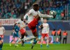 Leipzig's Nordi Mukiele controlls the ball during the Champions League group G soccer match between RB Leipzig and Zenit St. Petersburg in Leipzig, Germany, Wednesday, Oct. 23, 2019. (AP Photo/Jens Meyer)