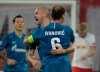 Zenit's Yaroslav Rakitskiy, left, celebrates after scoring the opening goal during the Champions League group G soccer match between RB Leipzig and Zenit St. Petersburg in Leipzig, Germany, Wednesday, Oct. 23, 2019. (AP Photo/Jens Meyer)