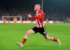Sheffield United's Oliver McBurnie celebrates after scoring his side's third goal during the English Premier League soccer match between Sheffield United and Manchester United at Bramall Lane Stadium in Sheffield, England, Sunday, Nov. 24, 2019. (AP Photo/Jon Super)