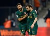 Monaco midfielder Youssef Ait-Bennasser, left, talks to Monaco midfielder Cesc Fabregas during the League One soccer match between Marseille and Monaco at the Velodrome stadium, in Marseille, southern France, Sunday, Jan. 13, 2019. (AP Photo/Claude Paris)