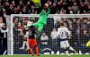 Manchester City goalkeeper Ederson saves during the Champions League, round of 8, first-leg soccer match between Tottenham Hotspur and Manchester City at the Tottenham Hotspur stadium in London, Tuesday, April 9, 2019. (AP Photo/Frank Augstein)