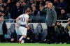 Tottenham's Harry Kane leaves the field of play after getting injured, as Manchester City coach Pep Guardiola stands during the Champions League, round of 8, first-leg soccer match between Tottenham Hotspur and Manchester City at the Tottenham Hotspur stadium in London, Tuesday, April 9, 2019. (AP Photo/Frank Augstein)