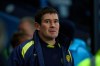 Burton Albion's manager Nigel Clough looks on during the English League Cup semi-final first leg soccer match between Manchester City and Burton Albion at the Etihad Stadium in Manchester, England, Wednesday, Jan. 9, 2019. (AP Photo/Dave Thompson)
