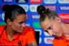 Netherlands' Sherida Spitse, left, and Netherlands goalkeeper Sari Van Veenendaal attend a press conference at the Stade de Lyon, outside Lyon, France, Saturday, July 6, 2019. Netherlands will face US in a Women's World Cup final match Sunday in Lyon. (AP Photo/Francois Mori)